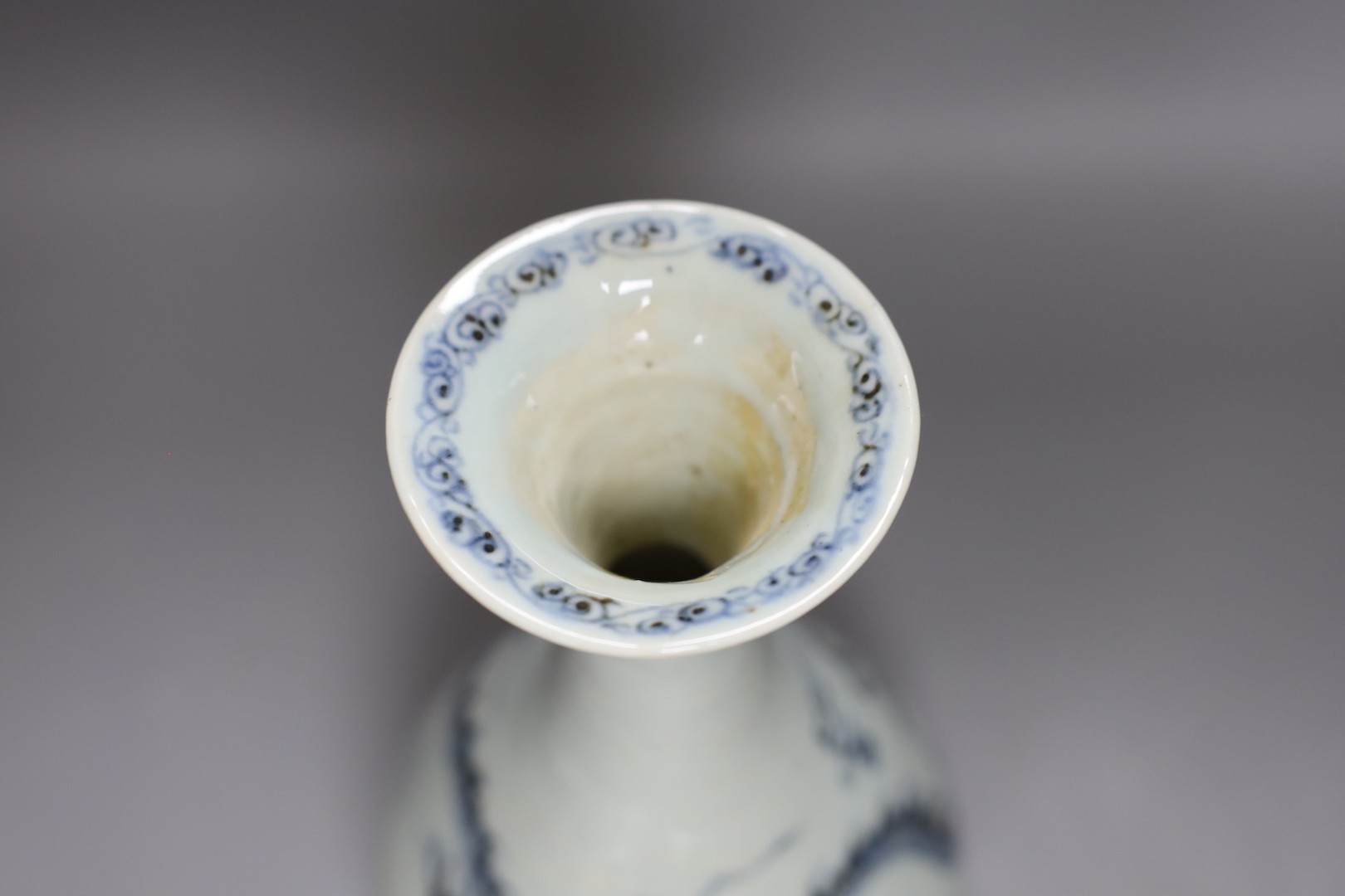 A Chinese blue and white ‘dragon’ bottle vase 25cm